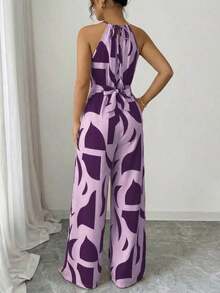 Mono de tela estampada con envolvente frontal para mujer, diseño que define la cintura para usar en ocasiones elegantes, ya sea de fiesta o diario - Morado - Ver 2