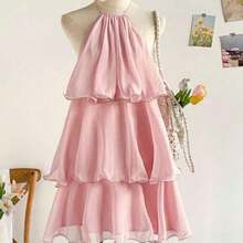 Vestido mini de verano con cuello halter, espalda descubierta y volante en el bajo, de color liso y sencillo para mujer - Rosa - Ver 1