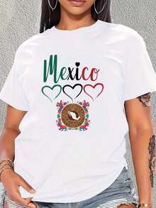 Camiseta de manga corta para mujer con estampado gráfico Orgullo Mexicano, corazón verde, blanco y rojo, calendario, estampado de piedra solar, cuello redondo informal, top cómodo de verano, ropa de moda cultural. - Blanco - Ver 1