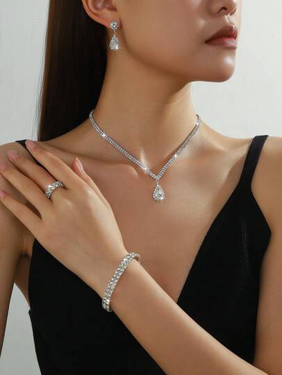 Juego de joyas de 5 piezas con incrustaciones de rhinestone en forma de lágrima, que incluye collar, aretes, pulsera y anillo. Adecuado para uso diario, bodas, fiestas. Accesorios elegantes y de moda, versátiles y de alta gama para mujeres.