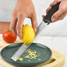 1Pack Lemon Zester Stainless Steel Cheese Grater With Plastic Cover Ergonomic Soft Black Handle Handheld Rotary Cheese Grater Zester Ideal For Kitchen Use And Food Preparation - 1 - View 4