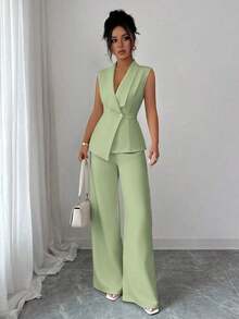 Conjunto de oficina elegante para mujer, compuesto por una chaqueta blazer sin mangas con cuello y bajo asimétrico, con hebilla metálica en la cintura, combinada con pantalones de cintura elástica.Conjunto de 2 piezas elegante para primavera/verano, atuendo formal y de clase para mujer. - verde menta - Ver 4