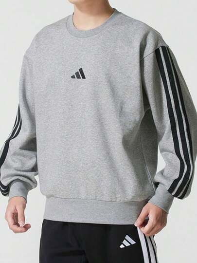  Áo nỉ dài tay thoải mái, màu xám trung bình, có sọc logo adidas dành cho nam giới JE6308