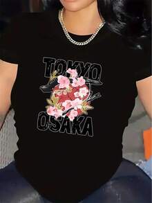 Camiseta vintage de manga corta para mujer, con un diseño floral inspirado en Tokio y Osaka, confeccionada en tela de poliéster ligera, adecuada para uso casual en casa o en restaurantes, cómoda y duradera, con elegantes estampados, ideal para salidas diarias y actividades de ocio. - Negro - Ver 1