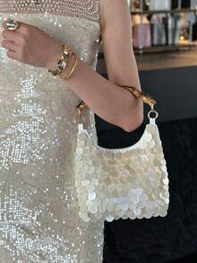 這款時尚米色貝殼形手提包是一款優雅的女士托特包，飾有閃亮亮片。它非常適合專業女性、年輕女性和時尚愛好者，可用於正式場合、派對、婚禮、購物和旅行。 - 米色 - 查看 4