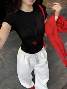女士百搭黑色简约多功能短款背心，适合海滩、日常穿着，修身剪裁，性感休闲夏季款 - 黑色 - 查看 1