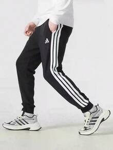 Adidas Pantalones deportivos casuales para hombre - Negro - Ver 1