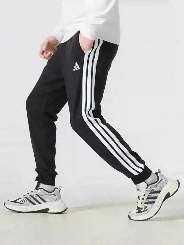 Adidas Pantalones deportivos casuales para hombre - Negro - Ver 1