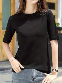 Camiseta de mujer elegante de un color - Rosa suave con cuello redondo y manga corta, perfecta para de verano, camiseta de diario| Top versátil| Ajuste cómodo - Negro - Ver 1