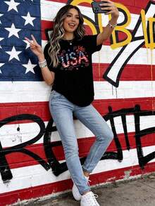 Impala Camiseta de cuello redondo de talla grande para mujer con diseño de la bandera patriótica de EE. UU. con estrellas y rayas, lazo decorativo, manga corta, para celebración del Día de la Independencia. - Negro - Ver 2