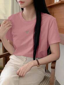 Camiseta casual de verano de mujer con cuello redondo y mangas cortas con detalle de corazón hueco - Rosa - Ver 4
