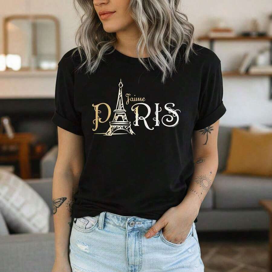 Camiseta de algodón con estampado gráfico de París para mujer, manga corta, cuello redondo, estilo casual, camiseta vintage con estampado de la Torre Eiffel, corte holgado, camisa básica para vacaciones de verano, tallas S-5XL disponibles, opciones de color negro/blanco/azul marino, tela de algodón suave y transpirable, ideal para uso diario o conjuntos de viaje. - Negro - Ver 1