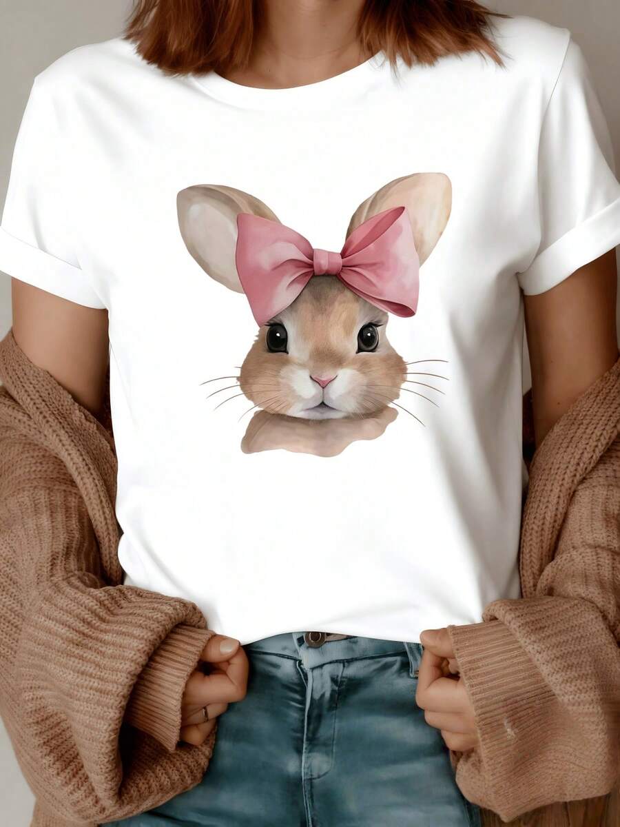 Conejo con gran lazo rosa que representa dulzura inocencia y energía femenina con mirada tierna que transmite calma y optimismo camiseta de mujer casual moderna cómoda para uso diario - Blanco - Ver 1