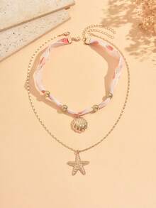 Bộ 2 dây chuyền ruy băng phong cách Bohemian lấy cảm hứng từ đại dương và dâu tây, thiết kế nhiều lớp với mặt dây chuyền hình vỏ sò và sao biển, thích hợp để đeo hàng ngày, đi nghỉ mát ở bãi biển và tham dự các lễ hội âm nhạc. - Nhiều màu - Xem 2