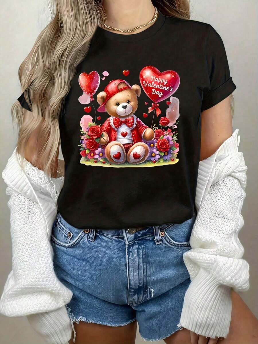 [Camiseta Teddy Heart] Camiseta de Mujer para el Día de San Valentín con Estampado de Oso de Peluche y Corazón - Top Casual de Cuello Redondo Suave con Diseño Adorable de Oso y Corazón, Blusa Lavable a Máquina para Atuendo Casual de Primavera, Verano, Otoño o Regalo de San Valentín, Tela Cómoda - Estilo Vintage Urbano Unisex, Camiseta de Manga Corta de Algodón Holgada con Cuello Redondo. blusas.blusas casuales para dama.Impresión de osos cariñosos.Camiseta estampada Impresión de osos cariñosos. - Negro - Ver 1