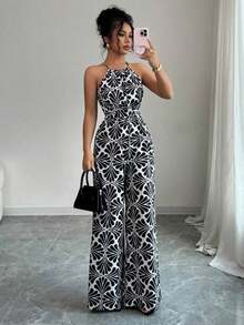 Mono de tela estampada con envolvente frontal para mujer, diseño que define la cintura para usar en ocasiones elegantes, ya sea de fiesta o diario - Blanco y Negro - Ver 7