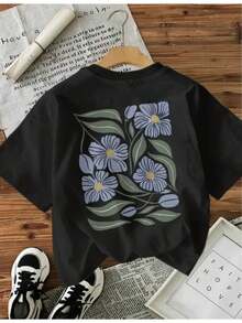 Lightweight And Loose - Extra Loose - Black Floral Print T-Shirt |  Casual T-Shirt With Light Blue Flowers And Green Leaves. | The Perfect Choice For Summer. | Comfortable Fabric | Unisex Regular Fit | Fashionable Urban Style, A Must-Have For Fashion Lovers. Casual Everyday Wear. - 黑色 - 查看 6