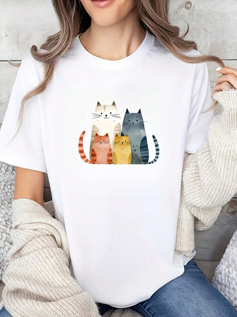 Camiseta Estampada para Mujer con Ilustración Colorida de Gato de Caricatura - Camiseta Casual de Manga Corta y Cuello Redondo, Corte Relajado para Todas las Estaciones, Perfecta para Uso Diario y Atuendos de Vacaciones (Lavable aáquina). - Blanco - Ver 1