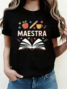 Women's T-Shirt With The Spanish Word MAESTRA, Meaning 'teacher', Featuring Illustrations Of Apples And A Pen. Ideal As A Gift For Birthdays, Easter, Or Mother's Day. Casual Black Short-Sleeved Crew Neck T-Shirt For Women. - 黑色 - 查看 1