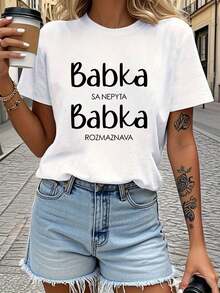 Women's T-Shirt With Letter Print "The Slovak Grandma Doesn't Ask, The Grandma Gives Advice", Casual Short Sleeve Round Neck T-Shirt For Summer And Spring, Women's Clothing, Women's Casual Printed T-Shirt, Short Sleeve And Round Neck, Local Urban Spring/Summer Fashion. - 黑色 - 查看 1