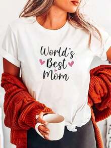 Noticias de Moda: Conjuntos de Verano para Mujeres. Camiseta de Mujer con Estampado de Corazón "La Mejor Mamá del Mundo", una Camiseta para Celebrar el Día de la Madre para las Madres, con un Estilo Suave y Dulce y Mangas. Esta camiseta blanca de cuello redondo para mujer cuenta con un elegante diseño vintage de moda. Ropa de verano para mujer, tops de verano para mujer, camiseta unisex de algodón holgada de estilo vintage con cuello redondo y manga corta. - Blanco - Ver 7