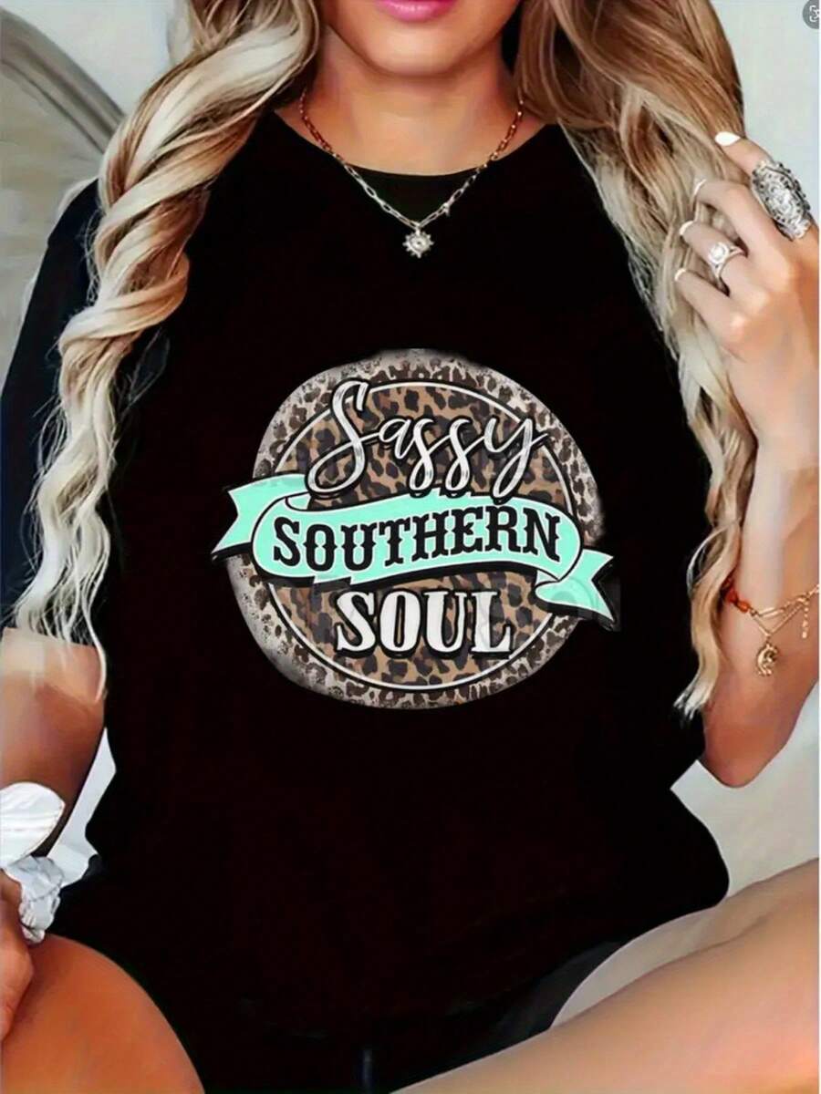 Una camiseta de mujer de manga corta, holgada, moderna, a la moda, retro y elegante, adecuada para actividades al aire libre en primavera y verano.Camiseta holgada para mujer - top de manga corta con cuello redondo y estampado de leopardo y letras, estilo casual deportivo en color negro, adecuada para todas las estaciones, lavable a máquina, un artículo imprescindible para tu guardarropa de primavera y verano.blusas para mujer,blusas casuales para dama,tops,, mujer premium,y2k,playeras de mujer curvy,ofertas y liquidaciones ropa mujer,playeras deportivas para mujer,,playeras de hombre, mujer,blusas>elegante KTW9 - Negro - Ver 1