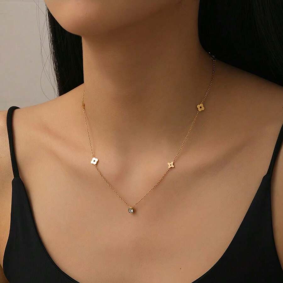 Dây chuyền mặt dây hình cỏ bốn lá đính một viên kim cương, mạ vàng 18K, kiểu dáng tối giản sang trọng phổ biến của Hàn Quốc và Nhật Bản. - Vàng - Xem 1