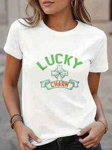 Soft, Breathable, And Lightweight For All-Day Comfort, Lucky Charm T-Shirt. | White Base T-Shirt With Green And Orange Text, Celtic Cross Design, Crew Neck, Short Sleeves, Casual Style, Slightly Stretchy Fabric. Classic Neckline With A Relaxed Fit That Flatters All Body Shapes And Is Easy To Pair With Jeans, Shorts, And Leggings. - 白色 - 查看 1