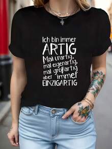 Women's T-Shirt With The German Phrase: "I Am Always Productive." Short-Sleeved T-Shirt With A Round Neck And German Lettering Print, Casual Blouse For Spring And Summer, Machine Washable, German Text Suitable For Casual Spring And Summer Outfits. Casual Women's Printed T-Shirt, Short-Sleeved, Round Neck, Local Urban Fashion For Spring/Summer. - 黑色 - 查看 1