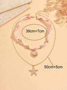 Bộ 2 dây chuyền ruy băng phong cách Bohemian lấy cảm hứng từ đại dương và dâu tây, thiết kế nhiều lớp với mặt dây chuyền hình vỏ sò và sao biển, thích hợp để đeo hàng ngày, đi nghỉ mát ở bãi biển và tham dự các lễ hội âm nhạc. - Nhiều màu - Xem 4