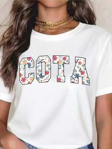 Camiseta Blanca Casual con Estampado Floral de la Letra COTA para Mujer - Top Casual de Verano, Perfecto para Festivales, Vacaciones y Uso Diario. - Blanco - Ver 7