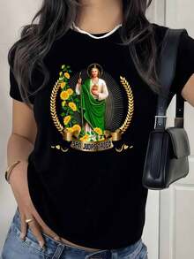100% Cotton. Representation Of Tadeo In Green Attire, A Symbol Of Faith, Hope, And Protection, Surrounded By Golden Sunflowers As An Emblem Of Light And Miracles. Women's 100% Cotton T-Shirt. Women's Simple Solid Color T-Shirt, Loose And Slim Fit Casual Short Sleeve - 黑色 - 查看 11