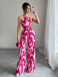 Mono de tela estampada con envolvente frontal para mujer, diseño que define la cintura para usar en ocasiones elegantes, ya sea de fiesta o diario - Rosa Fucsia - Ver 1