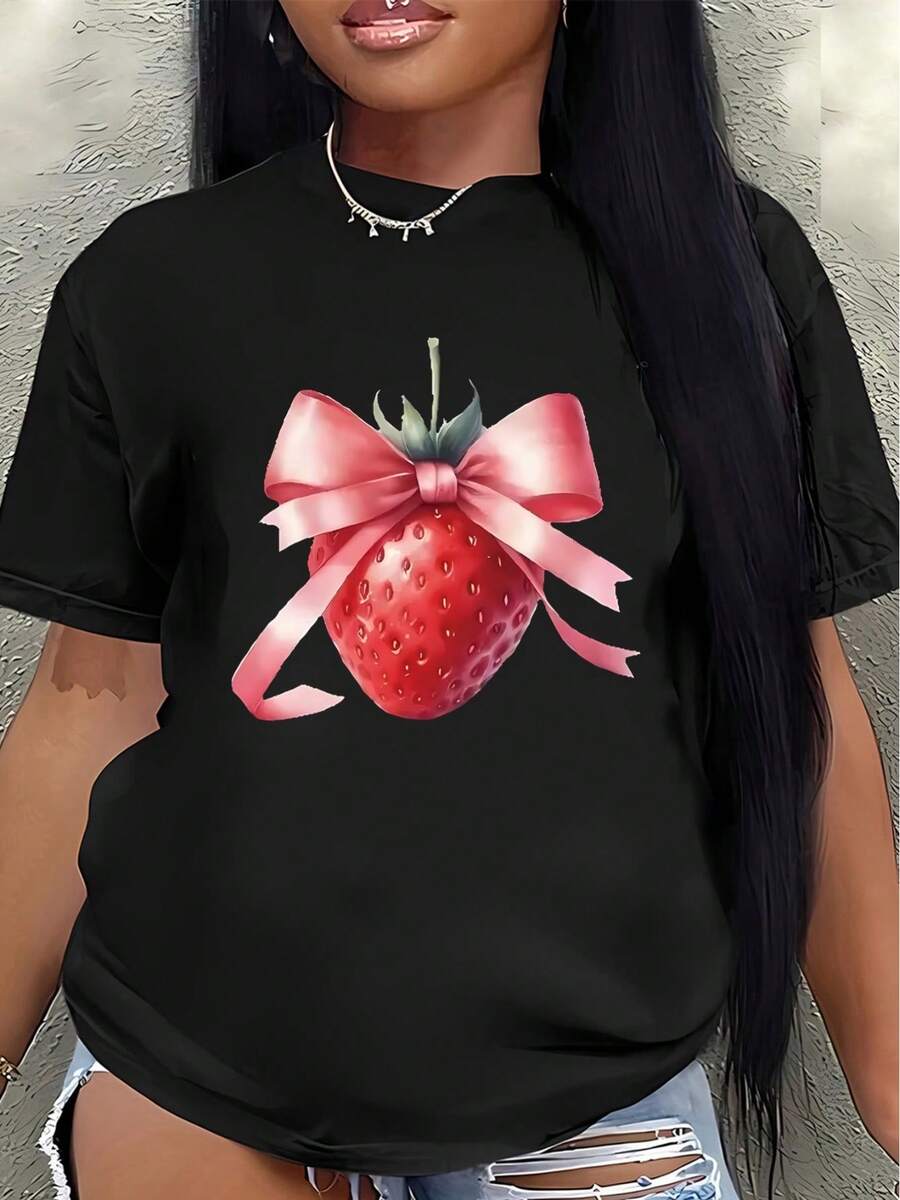 Camiseta ligera, con diseño de fresa y lazo rosa, es perfecta para salidas informales en casa o en una cafetería. Hecha de tela suave, garantiza comodidad para el uso diario.women's shirts - Negro - Ver 1