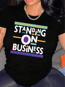 Camiseta Estampada para Mujer - Camiseta Casual de Manga Corta y Cuello Redondo en Negro con Diseño Colorido STANDING ON BUSINESS, Corte Relajado para Todas las Estaciones, Perfecta para el Uso Diario y Ocasiones Especiales (Lavable aáquina). - Negro - Ver 1