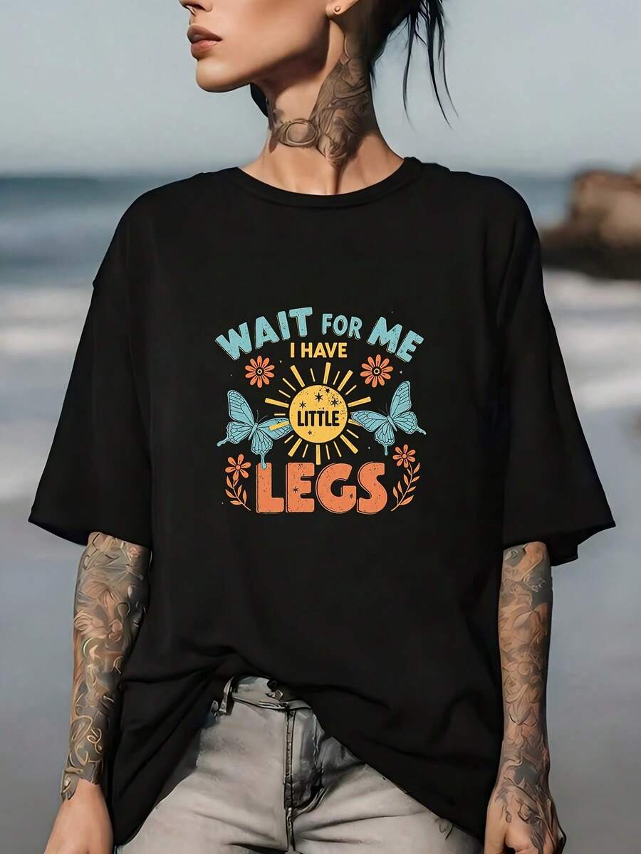 Espérame, tengo piernas pequeñas - Camiseta divertida y cómoda de 180 g para reuniones familiares, eventos de empresa y perfecta para regalar durante las fiestas. 100% algodón. - Negro - Ver 1