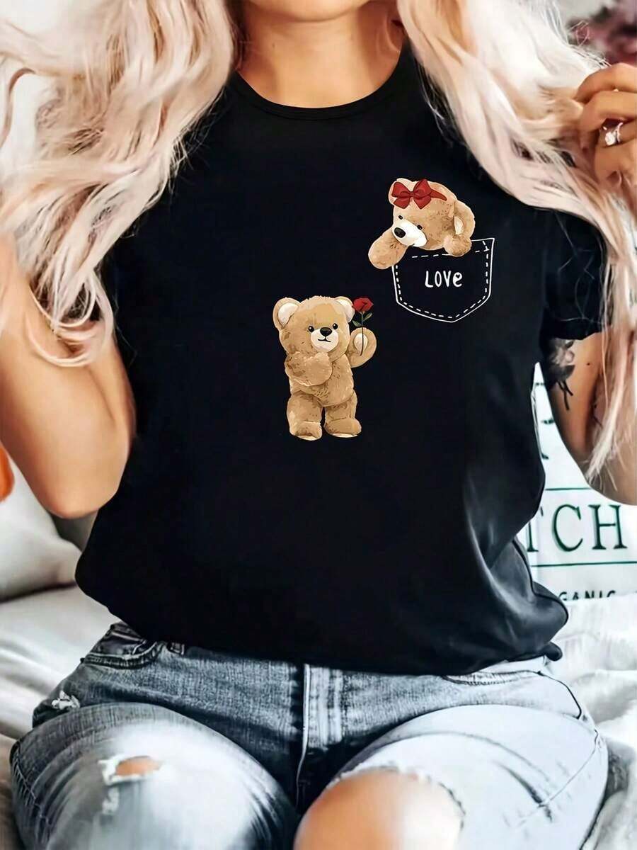 Unique Y2K T-Shirt With A Fun Teddy Bear Design And A Heart Highlighting The Pocket, Ideal For A And Romantic Look. Perfect For Everyday Wear And Accompanying You On Your Daily Adventures. Express Yourself With Style And Love. - 黑色 - 查看 1