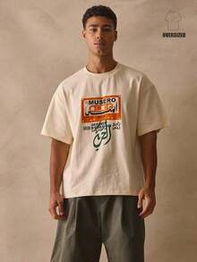 Camiseta de cuello redondo, de corte holgado, manga corta, hombros caídos, con estampado gráfico de un tocadiscos en la parte delantera, esencial para primavera y verano. - Albaricoque - Ver 6