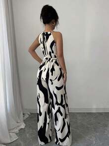 Mono de tela estampada con envolvente frontal para mujer, diseño que define la cintura para usar en ocasiones elegantes, ya sea de fiesta o diario - Multicolor 2 - Ver 2