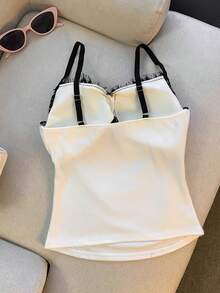 レディース キャミソール カップ付き ブラトップ レース 配色 バイカラー 重ね着風 ショート丈 クロップド丈 へそ出し タンクトップ インナー トップス 着痩せ 細見え タイト フィット 韓国ファッション 大人可愛い セクシー フェミニン ガーリー ギャル デコルテ 魅せ 胸パッド入り 下着 ノースリーブ 夏 涼しい ストレッチ 伸縮性 柔らかい ワンマイルウェア 部屋着 ルームウェア デート お出かけ カジュアル きれいめ まつ毛レース ビスチェ風 華奢見え 1枚で決まる ホワイト ブラック 楽ちん 旅行 リゾート 海 ビーチ コーデ レイヤード - ホワイト - チェックする 3