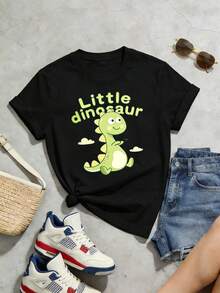 Camiseta de manga corta con cuello redondo suave y casual para mujer, con estampado gráfico de un pequeño dinosaurio, adecuada para conjuntos casuales de primavera y verano. Blanca. - Negro - Ver 5