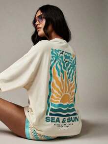 Break The System Beach Surf Club Sea Sun Camiseta Retro de Verano con Diseño Gráfico Tropical de Palmeras y Olas, Estilo Vintage, Vacaciones en Resort, Diseño de Atardecer, Estilo Californiano, Comodidad Casual, Cuello Redondo, Corte Holgado - Blanco - Ver 6
