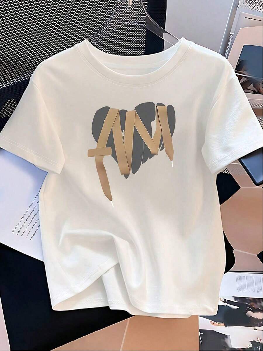 Camiseta de manga corta negra para mujeres y adolescentes - Bonito estampado de corazón 'MNM' y letras doradas 'I AM', suave, ligera, informal, para verano, cuello redondo, para uso diario, versátil para todas las estaciones, lavable a máquina, ideal para fiestas. blusas para mujer>ropa - Blanco - Ver 1
