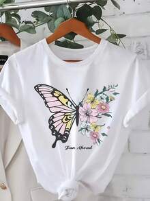 Camiseta de mujer con estampado floral de mariposas blancas - top de manga corta con estampado floral en rosa claro y amarillo, corte holgado, con lazo rosa suave y diseño de manga de mariposa, lavable a máquina, camisa casual para uso diario, adecuada para conjuntos de primavera y verano, atuendo para fiestas de Pascua, estampado digital de corte holgado apto para todas las estaciones, estampado floral y de mariposas vibrante, top de moda para mujer cómodo y versátil, 100% algodón. - Blanco - Ver 6