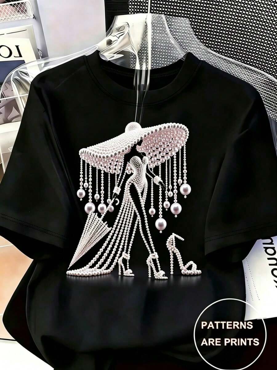 Camiseta Estampada para Mujer - Camiseta Casual de Manga Corta y Cuello Redondo en Negro con Diseño Intrincado de Patrón de Perlas. Corte Relajado para Todas las Estaciones, Perfecta para el Uso Diario y Atuendos de Vacaciones (Lavable aáquina). - Negro - Ver 1