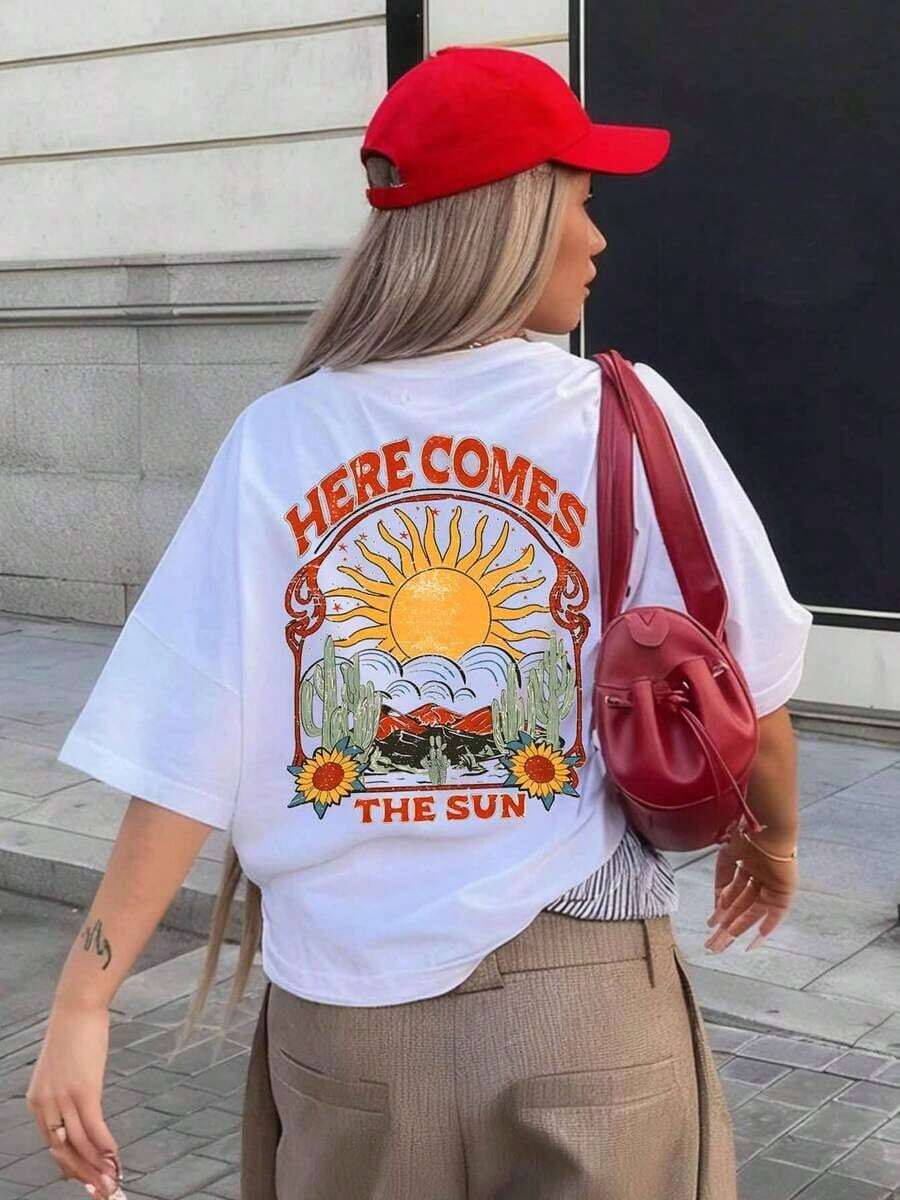 Camiseta de manga corta estilo vintage occidental para mujer 2026, 100% algodón, corte holgado, estampado de cactus y sol "HERE COMES THE SUN", top casual transpirable, ropa de calle para vacaciones de verano, estampado de letras, camiseta de manga corta de playa de verano para mujer adulta, tela transpirable, adecuada para la temporada de regreso a clases, ideal para uso diario, regalo perfecto, tops de verano para mujer, transpirable y cómoda. - Blanco - Ver 1