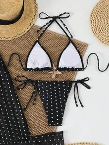 Bộ bikini 3 mảnh chấm bi đen trắng gồm áo tam giác buộc dây cổ, quần buộc dây bên hông và khăn choàng lưới che ngoài, thích hợp mặc đi biển. - Nhiều màu - Xem 5