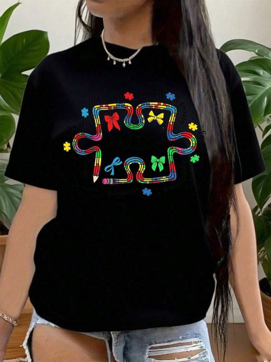 Camiseta vintage de algodón para mujer con diseño de piezas de rompecabezas coloridas y lazo, ideal para la concientización sobre el autismo, se puede usar en salidas casuales y eventos diarios. - Negro - Ver 1
