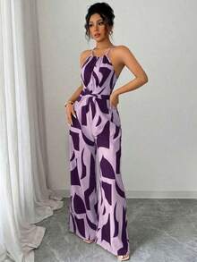 Mono de tela estampada con envolvente frontal para mujer, diseño que define la cintura para usar en ocasiones elegantes, ya sea de fiesta o diario - Morado - Ver 4