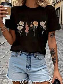 Camiseta suave para mujer, informal para uso diario, con estampado de arreglos florales vintage, blusa casual adecuada para el ocio diario, blusas elegantes para dama. - Negro - Ver 1